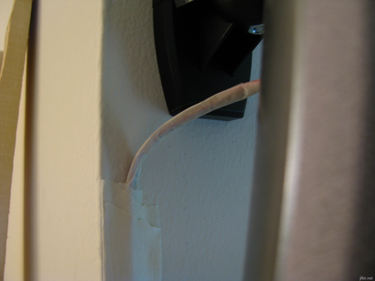 How to hide wall mounted speaker wires in your apartment for under